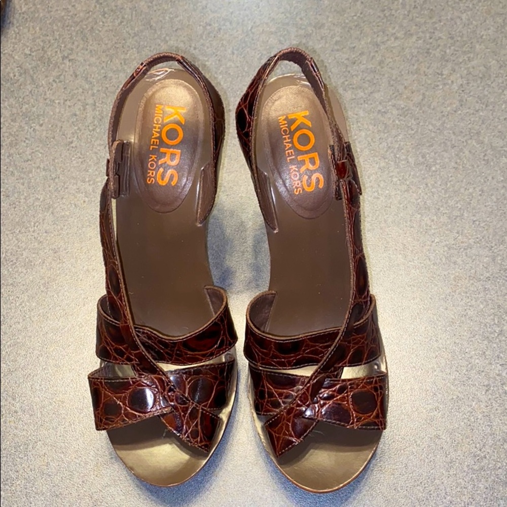 Michael Kors brown, croc embossed slingback’s